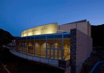 a large building is lit up at night